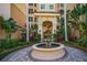 Ornate fountain at the entrance of a condo building at 393 N Point Rd # 503, Osprey, FL 34229