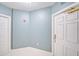 Neutral-toned condo entryway with two doors at 393 N Point Rd # 503, Osprey, FL 34229