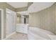 Bathroom with a shower and bathtub at 393 N Point Rd # 503, Osprey, FL 34229