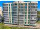 Modern building exterior with balconies and parking at 393 N Point Rd # 503, Osprey, FL 34229