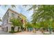 Quaint street view of Rosemary District buildings with lush landscaping and outdoor seating at 433 Central Ave, Sarasota, FL 34236