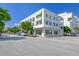 Modern building exterior with ample parking and lush landscaping at 433 Central Ave, Sarasota, FL 34236