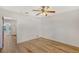 Bright bedroom with hardwood floors and ceiling fan at 433 Central Ave, Sarasota, FL 34236