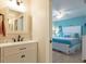 Bathroom with vanity and view of bedroom at 213 75Th St, Holmes Beach, FL 34217
