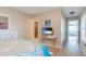 Spacious bedroom with ensuite bathroom and TV at 213 75Th St, Holmes Beach, FL 34217