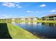 Tranquil lake view of the community at 23411 Collina Way # 9102, Port Charlotte, FL 33980