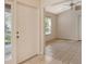 Welcoming entryway with a tiled floor leading into a bright, open-concept living space at 4072 Fairway Pl, North Port, FL 34287