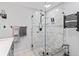 Elegant bathroom with large shower and marble tile at 4108 101St W St, Bradenton, FL 34210