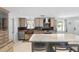 Updated kitchen with copper sink, stainless steel appliances and granite countertops at 4108 101St W St, Bradenton, FL 34210