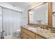 Bathroom with granite countertop and a shower/tub combo at 4108 101St W St, Bradenton, FL 34210