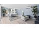 Spacious bedroom with a comfortable bed and plenty of natural light at 4108 101St W St, Bradenton, FL 34210
