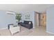 Light and airy living space with comfortable seating and access to other rooms at 4108 101St W St, Bradenton, FL 34210