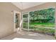 Relaxing screened patio with access to the backyard at 4072 Fairway Pl, North Port, FL 34287