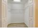 Large walk-in closet with double doors and wire shelving at 4072 Fairway Pl, North Port, FL 34287