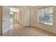 Bright office with tile flooring and access to other rooms at 4072 Fairway Pl, North Port, FL 34287