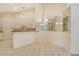 Dining area with mirrored wall and a chandelier at 4072 Fairway Pl, North Port, FL 34287