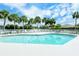 Inviting community pool with lounge chairs at 4072 Fairway Pl, North Port, FL 34287