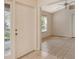 Inviting entryway with tile flooring and access to a room at 4072 Fairway Pl, North Port, FL 34287