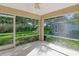 Spacious screened patio overlooking the backyard at 4072 Fairway Pl, North Port, FL 34287