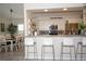Kitchen with breakfast bar and seating for four at 6772 Greenview Ln, Englewood, FL 34224