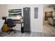 Bright home office features a desk, file cabinet, and storage at 6772 Greenview Ln, Englewood, FL 34224