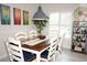 Kitchen dining area with wood table and chairs at 6772 Greenview Ln, Englewood, FL 34224