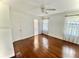 Hardwood floors, ceiling fan, and access to bathroom at 5817 28Th Avenue E Dr, Bradenton, FL 34208