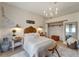 Charming bedroom with a queen-size bed and farmhouse style decor at 12307 S Access Rd, Port Charlotte, FL 33981