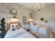 Bright bedroom featuring twin beds and decorative accents at 12307 S Access Rd, Port Charlotte, FL 33981