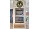 Built-in double oven with a modern design and stylish wood accents at 12307 S Access Rd, Port Charlotte, FL 33981