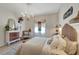 Elegant bedroom with a queen-size bed and rustic-chic decor at 12307 S Access Rd, Port Charlotte, FL 33981