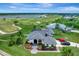Luxury home with golf course and lake views, spacious backyard, and two-car garage at 12307 S Access Rd, Port Charlotte, FL 33981