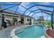 Inviting pool with patio and grilling area at 12307 S Access Rd, Port Charlotte, FL 33981
