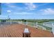 Private deck overlooking a golf course and lake at 12307 S Access Rd, Port Charlotte, FL 33981