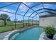 Enclosed pool area with a relaxing view at 12307 S Access Rd, Port Charlotte, FL 33981