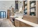 Modern kitchen with sleek appliances, custom cabinetry, and a marble backsplash at 12307 S Access Rd, Port Charlotte, FL 33981