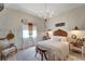 Charming bedroom with rustic-chic decor and a cozy atmosphere at 12307 S Access Rd, Port Charlotte, FL 33981
