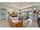 Bright living room with a view of the backyard and pool at 12307 S Access Rd, Port Charlotte, FL 33981