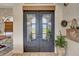 Inviting entryway with double doors and a decorative wreath at 12307 S Access Rd, Port Charlotte, FL 33981