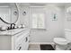 Clean bathroom, featuring a vanity with a large mirror at 1611 Ballard Park Dr, Bradenton, FL 34205