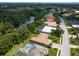 Community overview showcasing houses, lush landscape, and waterway at 6747 Coyote Ridge Ct, Bradenton, FL 34201