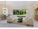 Spacious living room with light and airy feel, access to backyard at 6747 Coyote Ridge Ct, Bradenton, FL 34201