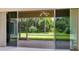 Spacious screened porch overlooks lush green backyard at 6747 Coyote Ridge Ct, Bradenton, FL 34201