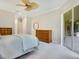 Serene bedroom with ample closet space and sliding doors to the patio at 6747 Coyote Ridge Ct, Bradenton, FL 34201