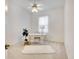 Spacious bedroom with white desk and fluffy rug at 6747 Coyote Ridge Ct, Bradenton, FL 34201