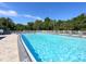 Refreshing community pool with ample deck space for lounging at 6747 Coyote Ridge Ct, Bradenton, FL 34201