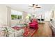 Living room with comfy seating and a view into kitchen at 2310 Lark Ln # 22, Sarasota, FL 34231