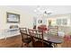 Formal dining room with a dark wood table and chairs at 2310 Lark Ln # 22, Sarasota, FL 34231