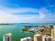 Aerial view of waterfront community with boats and high-rise buildings at 2310 Lark Ln # 22, Sarasota, FL 34231