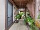 Inviting entryway with lush potted plants and a private entrance at 5026 Water Oak Dr # 119, Bradenton, FL 34207